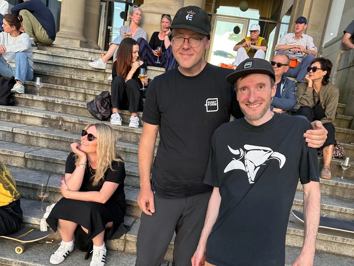 Companions on the steps in front of the StadtPalais Stuttgart
