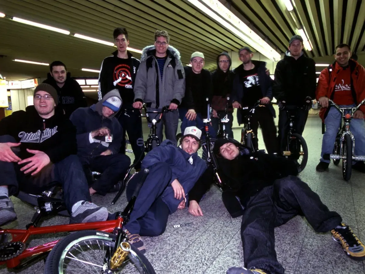 A group shot with bikes in the hall