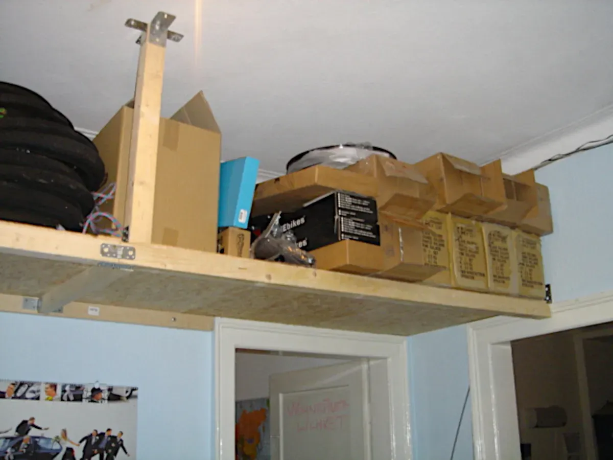 The first boxes, stacked above the door
