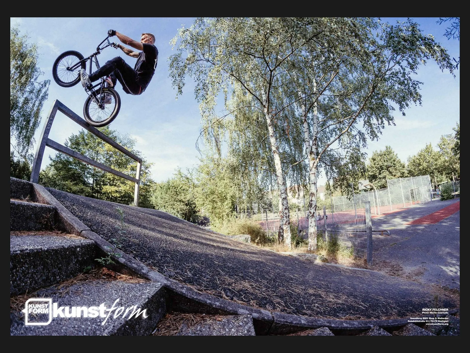 Team poster 2018: Ricky Felchner over a ledge between birch trees, photo Merlin Czarnulla