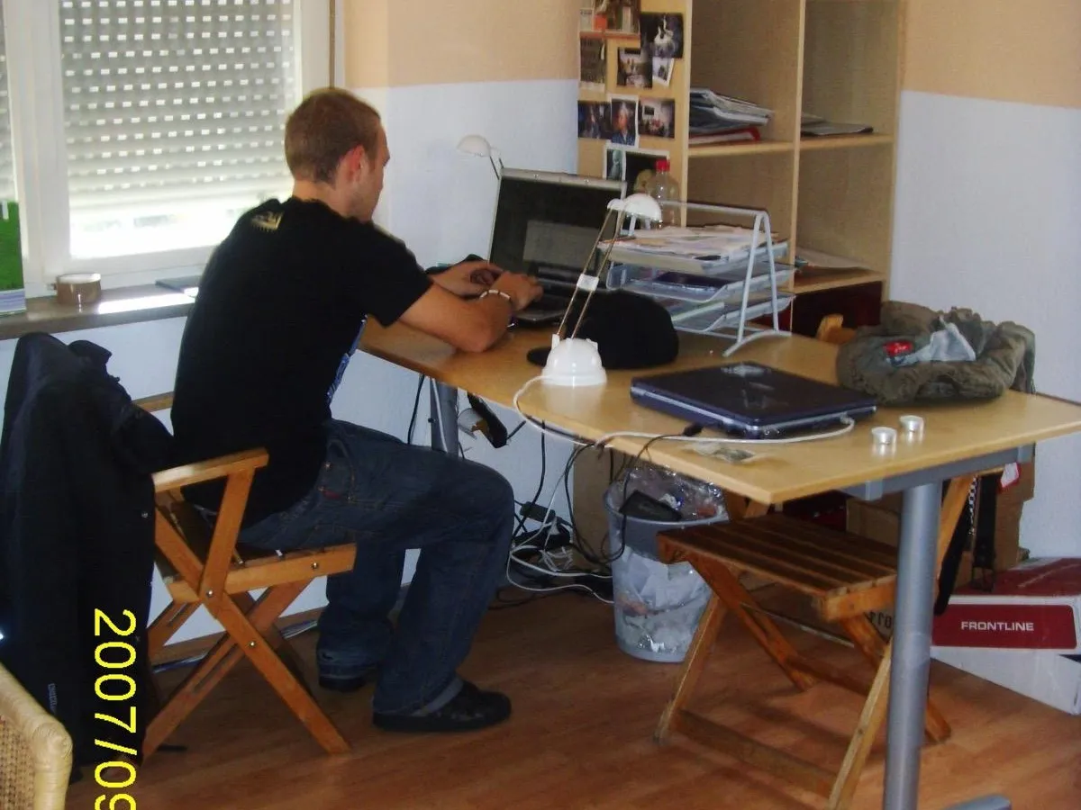 At the desk in the shared flat