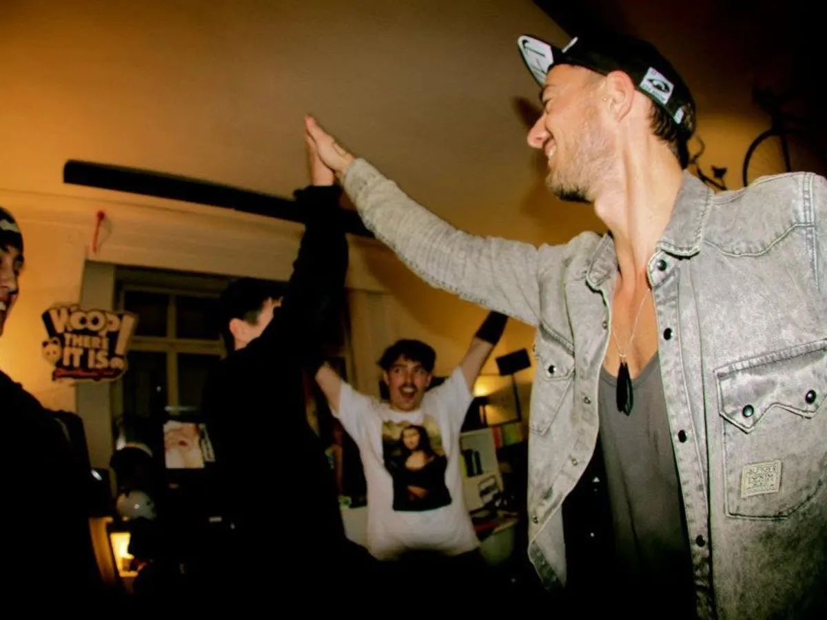High five at the three-years party