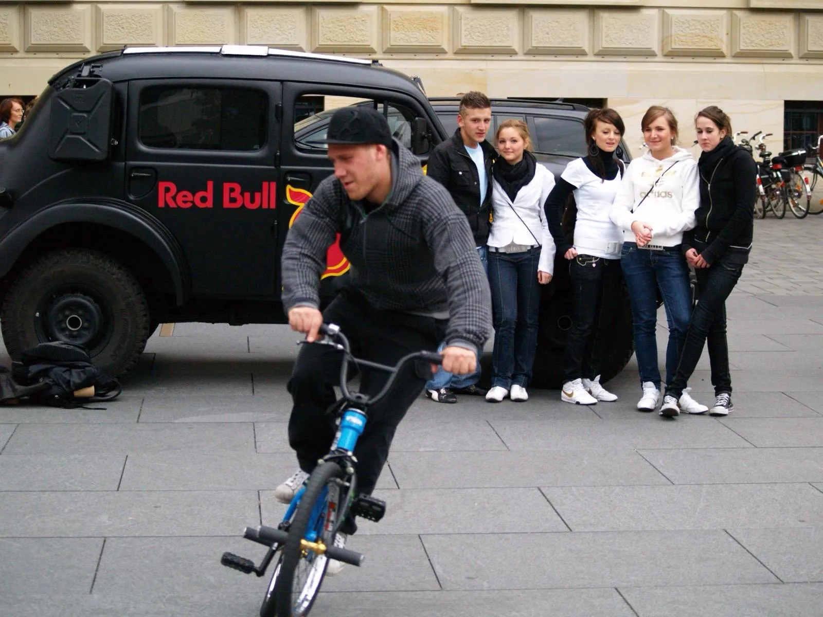 Fuhre at a show in front of the Red Bull car