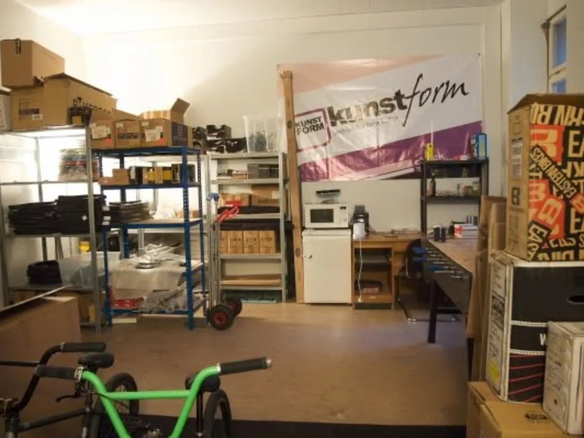 Shelves, boxes and a bike: the first warehouse