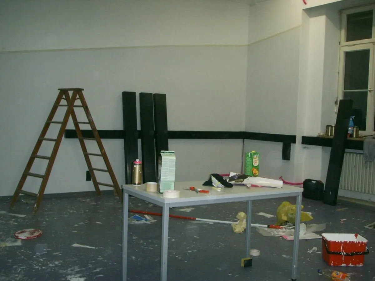 Mid-paint: ladder, paint, chaos