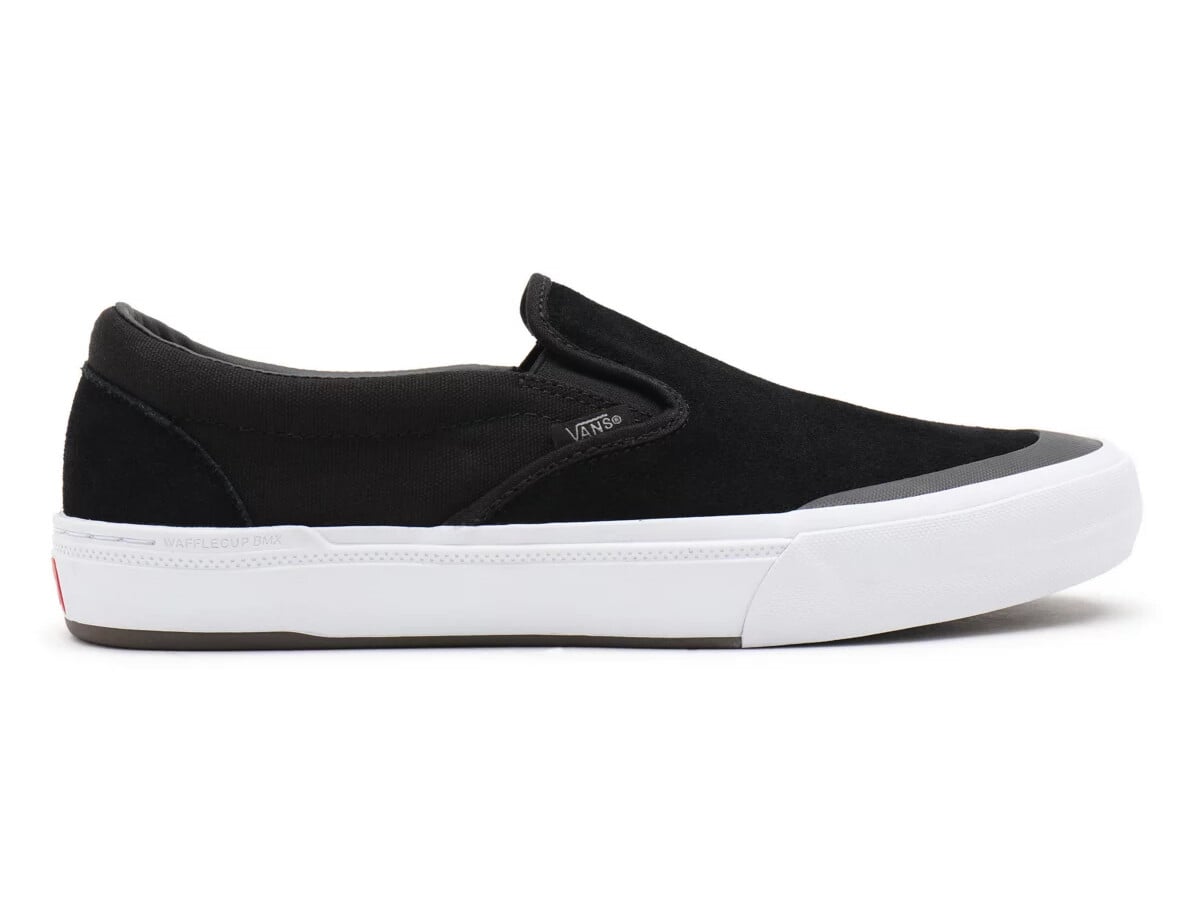 vans black pro slip on